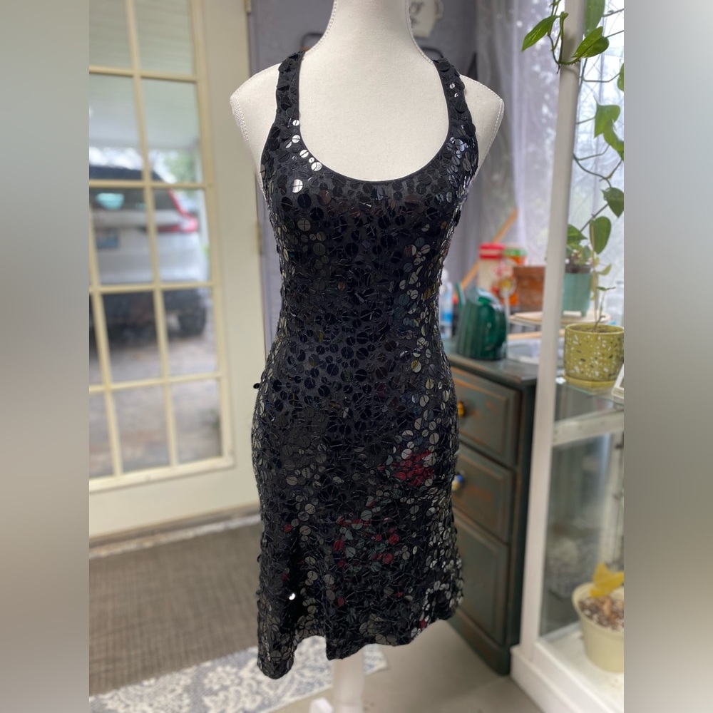 The limited black sequin dress razor back with low cut front size extra small